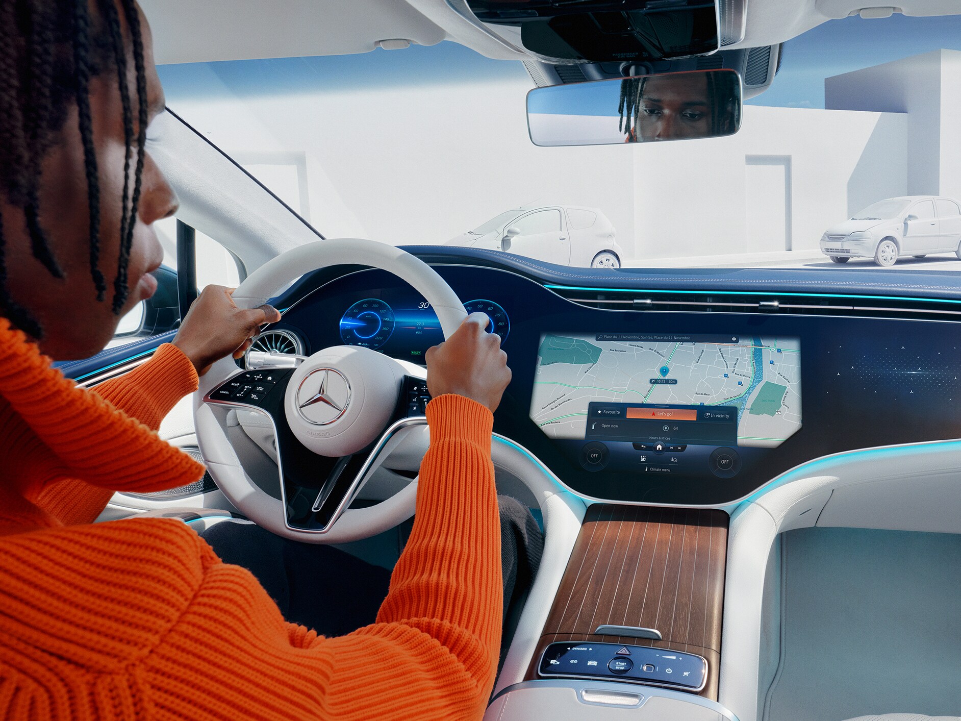 Man using the MBUX Voice Assistant in his vehicle.