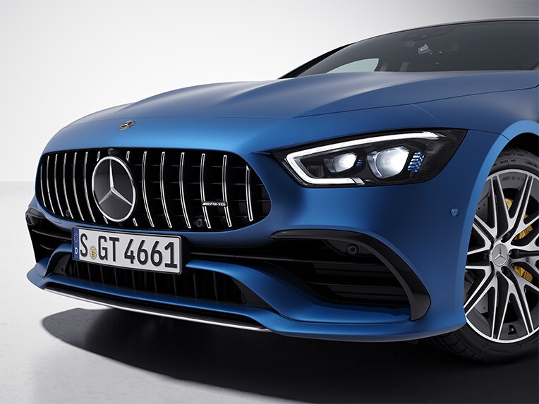 Angled front view of the Mercedes-AMG GT 4-door Coupé with AMG Exterior Chrome package.