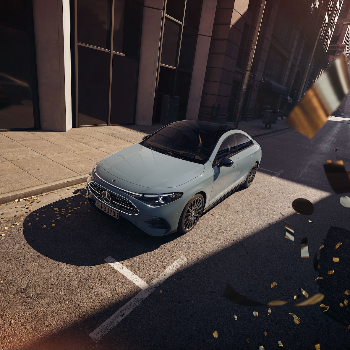Frontal side view (from a slightly elevated perspective because of the panoramic roof) of the Mercedes-Benz CLA C178 with AMG Line Plus.