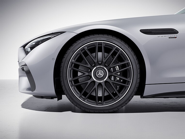 A light-alloy wheel with black brake calliper.