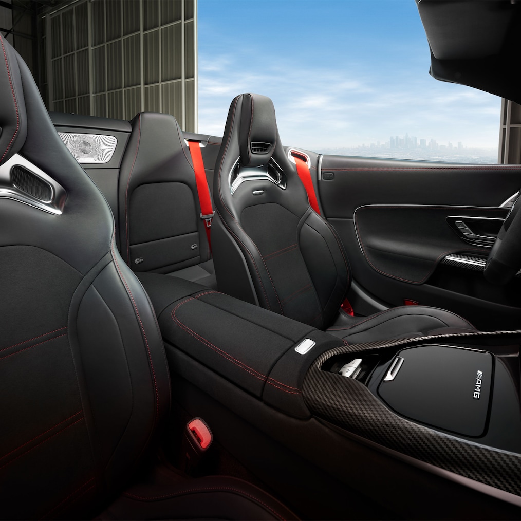 Mercedes-AMG SL Roadster with soft top down, seen from above or Illustration of AMG rear axle steering.