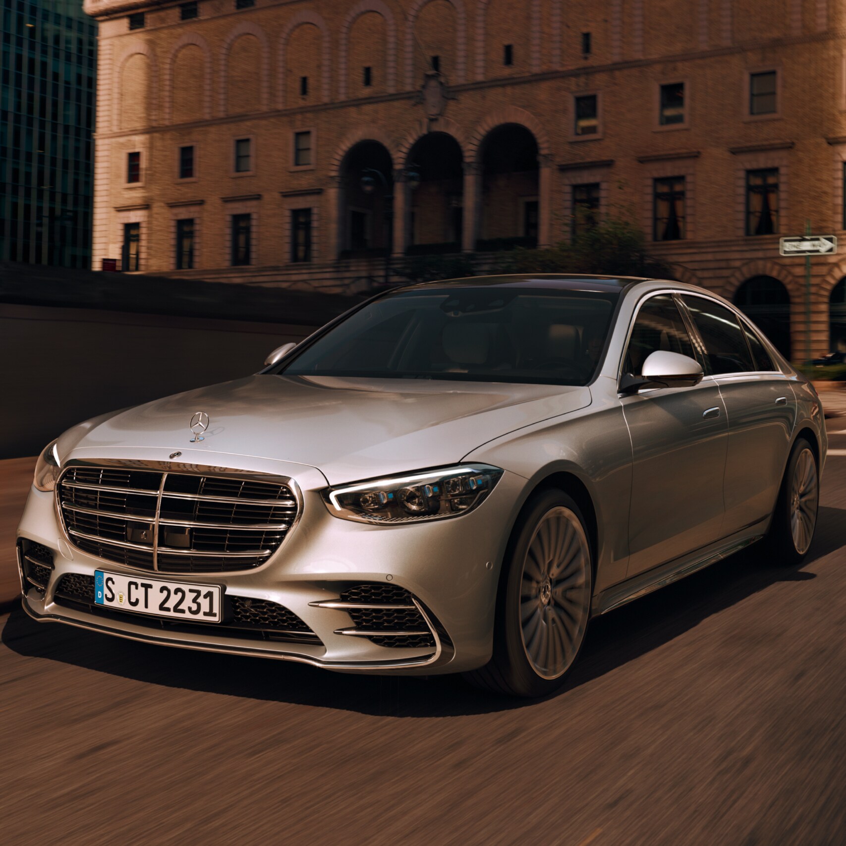 Mercedes-Benz S-Class, silver, driving on a road in a front view