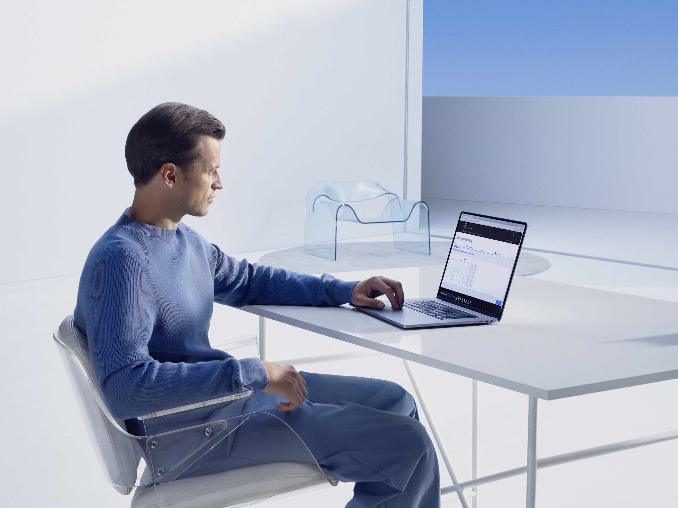 A man booking his Mercedes-Benz service appointment online.