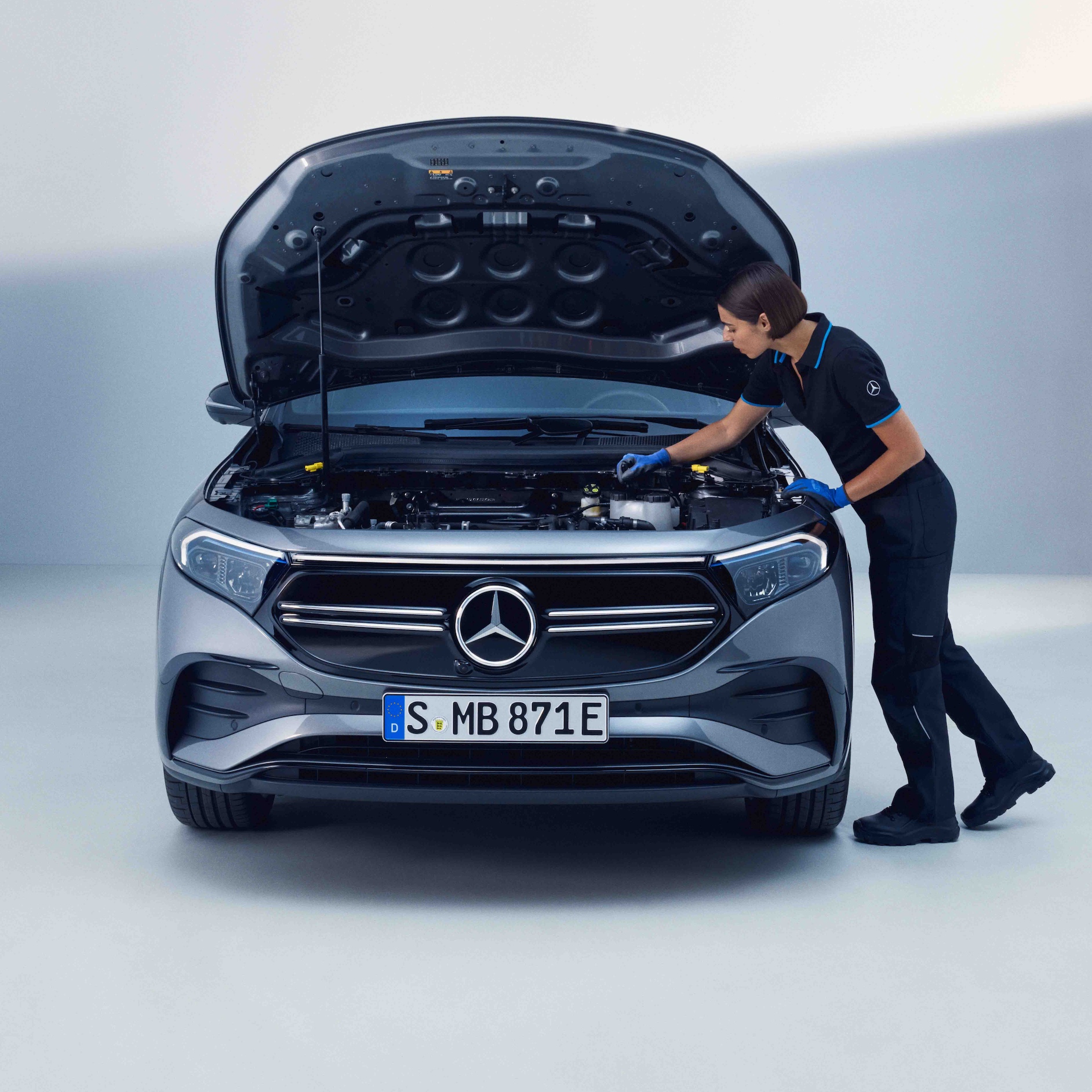 Mercedes-EQ | Mercedes-Benz A Mercedes-Benz technician checks a Mercedes-EQ.