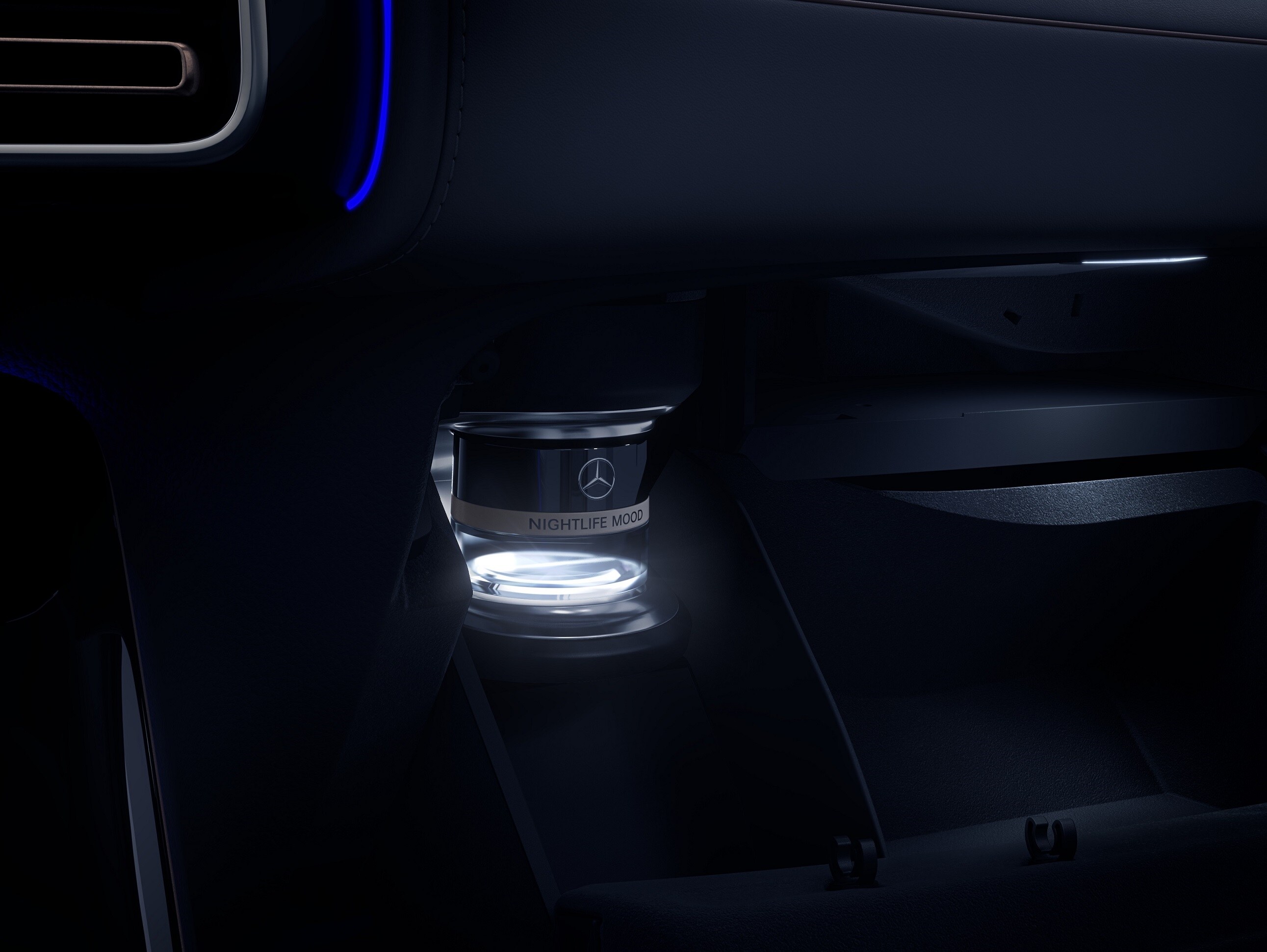 A bottle of the Nightlife Mood variety is illuminated as it releases the fragrance into the interior of the Mercedes.