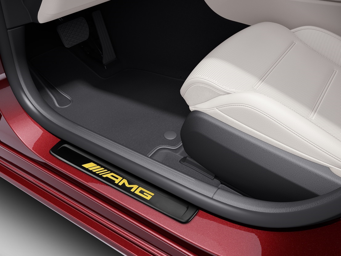 AMG interchangeable cover | Mercedes-Benz A red Mercedes-Benz fitted with an AMG interchangeable cover with yellow lettering.