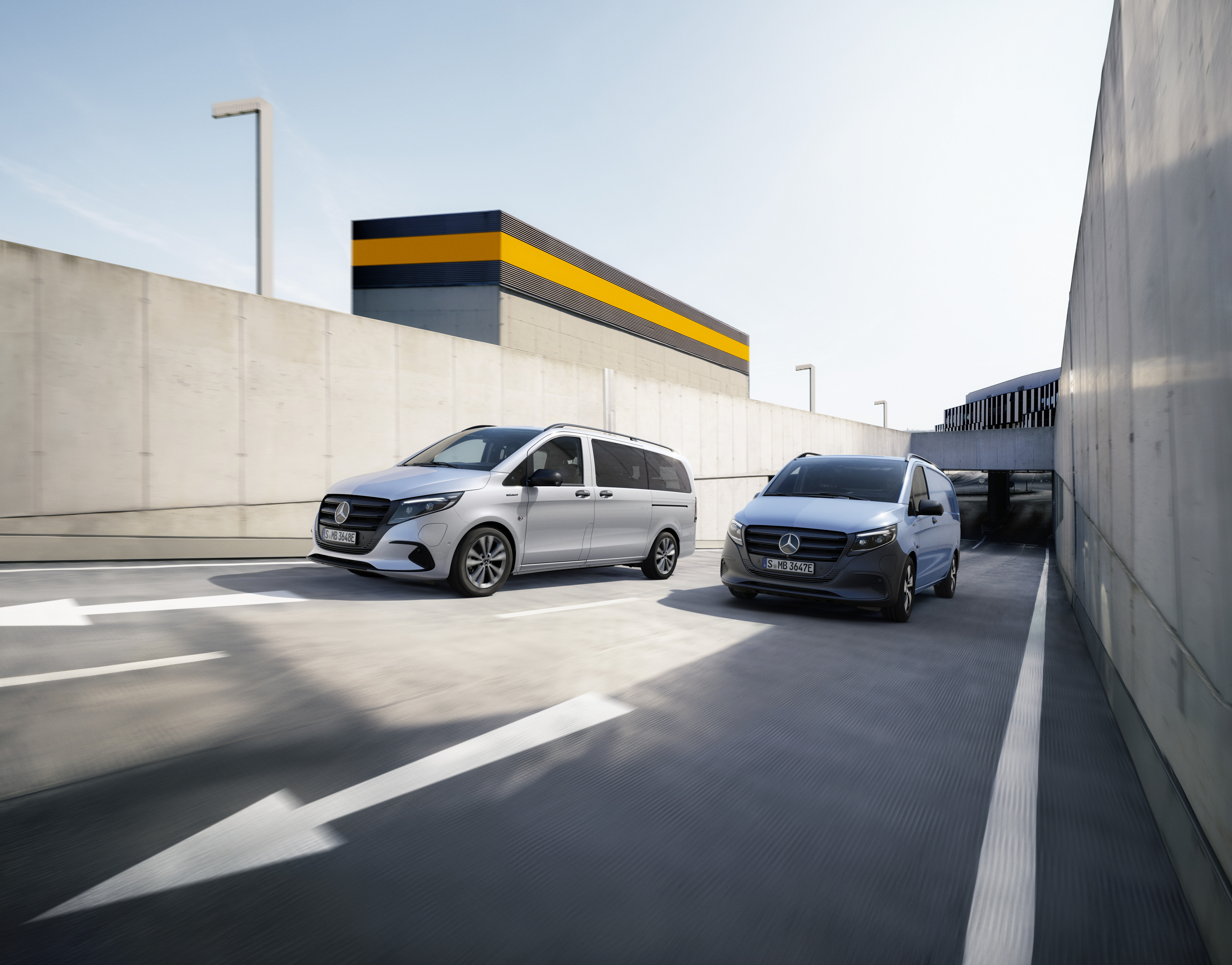 eVito Tourer & eVito Panel Van | Mercedes-Benz Mercedes-Benz eVito Tourer and eVito Panel Van driving on a road.