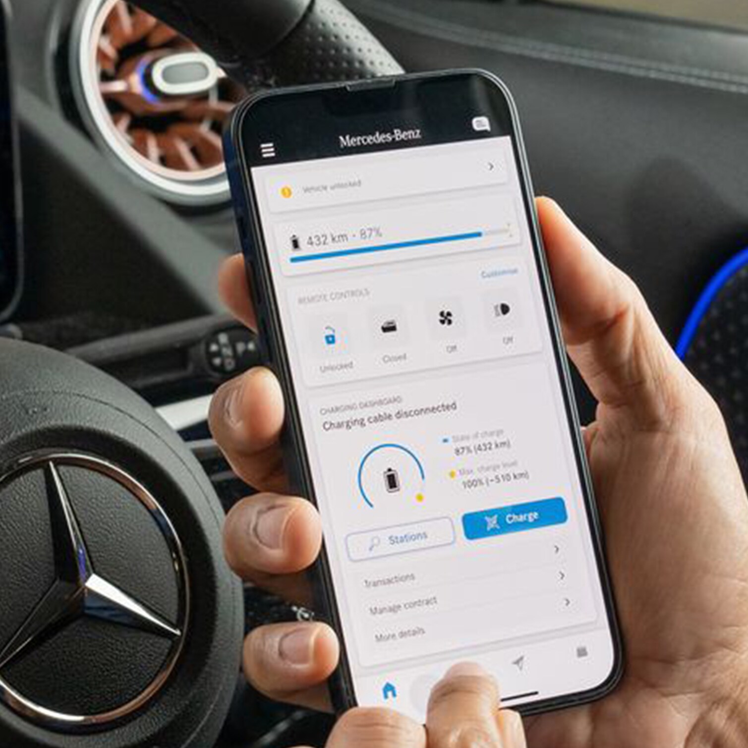 A person holding a Mercedes me Charge card